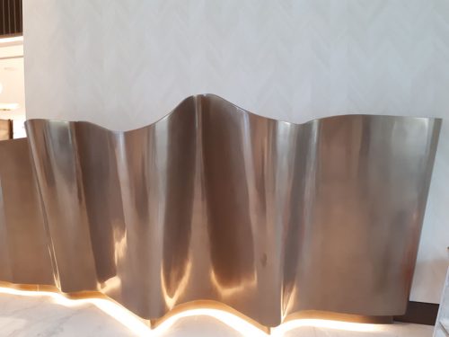 Project- Jumeirah Beach Hotel Dubai; Finish Code - CT-09; Finish - Bronze Polished; Substrate; Wooden Counter; Size - 1200mm X 15000mm